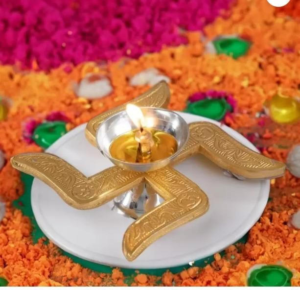 Traditional Brass Swastik Diya – Illuminate Your Space with Prosperity and Charm