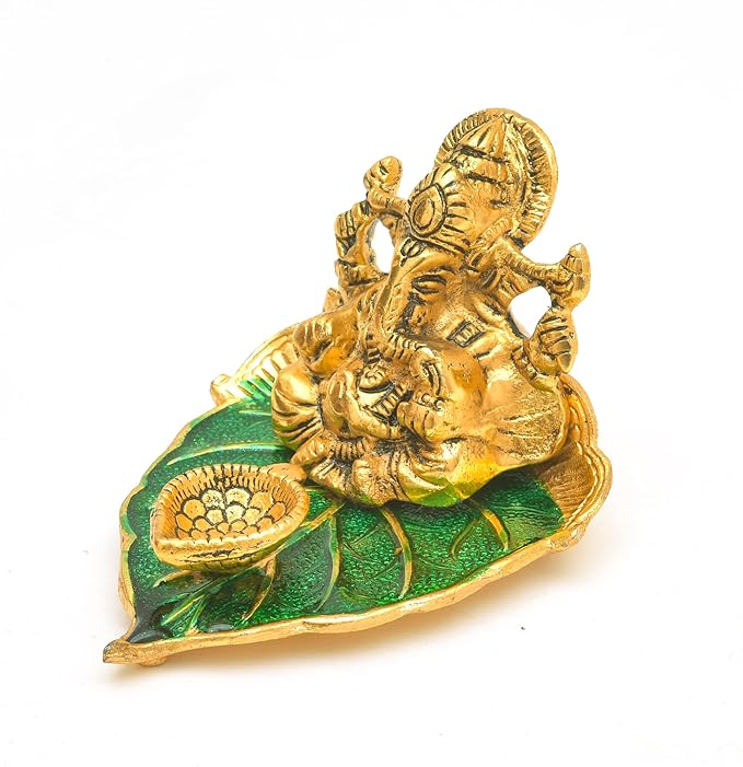 Elite Brass Metal Ganesh Ji Sitting on The Green Leave with Diya Deepak , Golden Decorative Showpiece - 9 cm  (Brass, Gold)